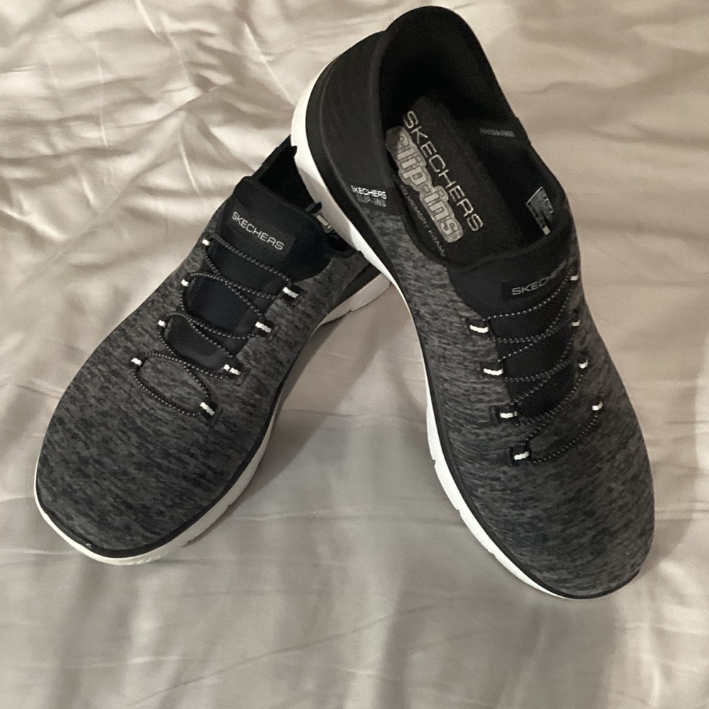 Skechers Women’s Charcoal and Black slip ons. Like new only worn twice.